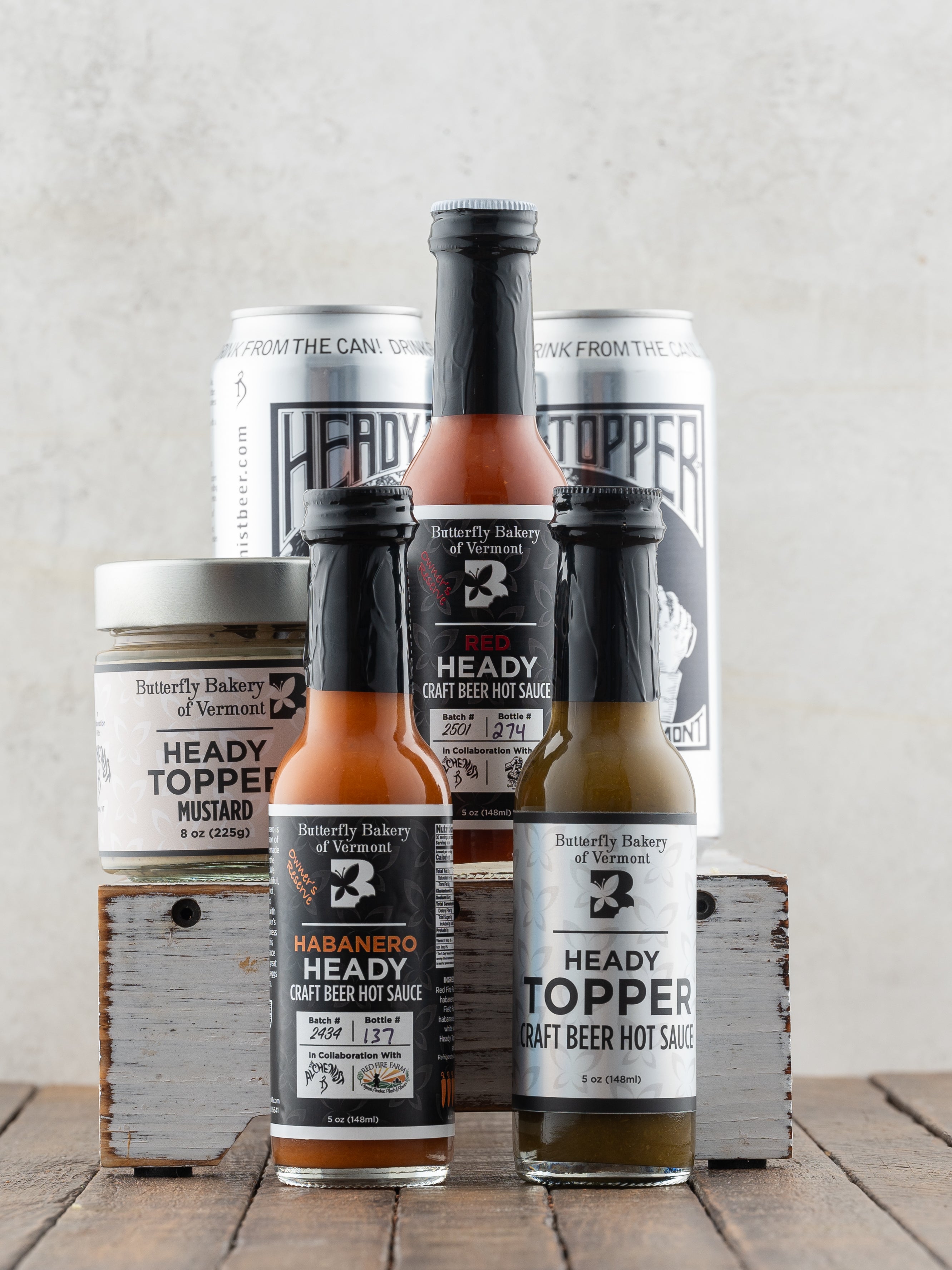 Butterfly Bakery of Vermont full line of Heady Topper products on a wood surface