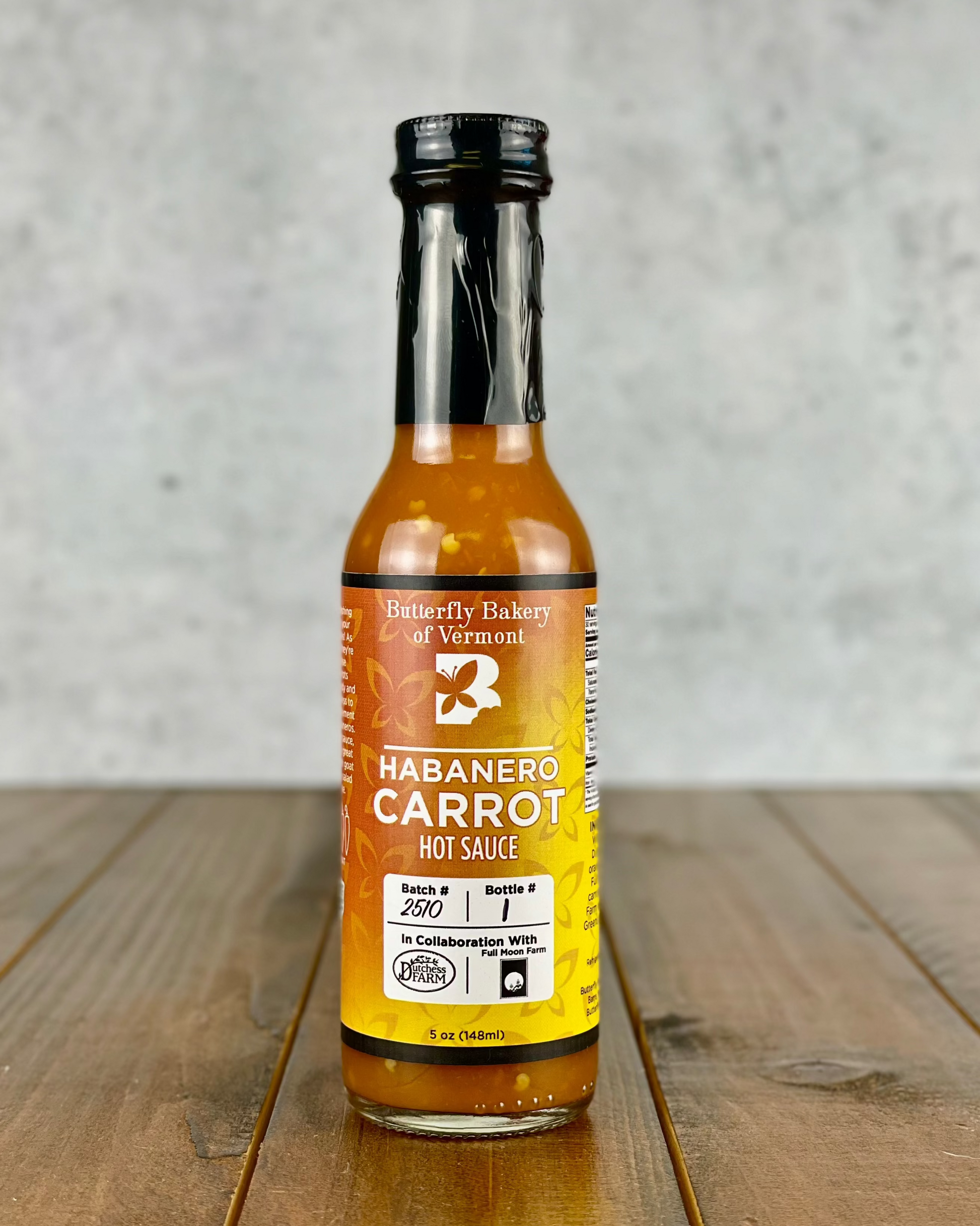 Bottle of Habanero Carrot hot sauce from Butterfly Bakery of Vermont